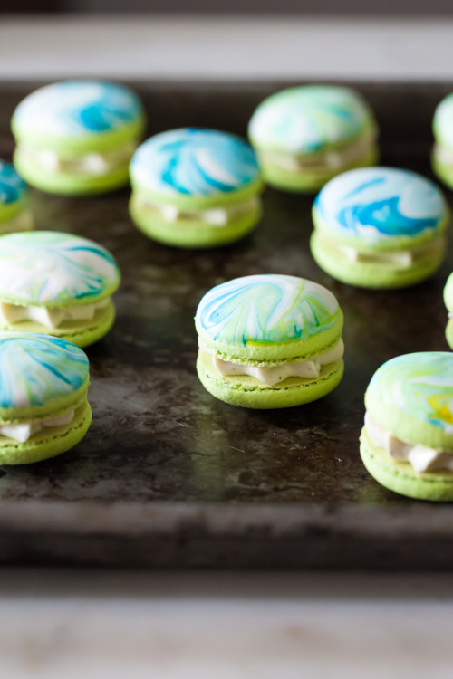 sweetoothgirl: Marble Macarons with Earl Grey Buttercream and Pink Lemonade Filling Reblogging Today