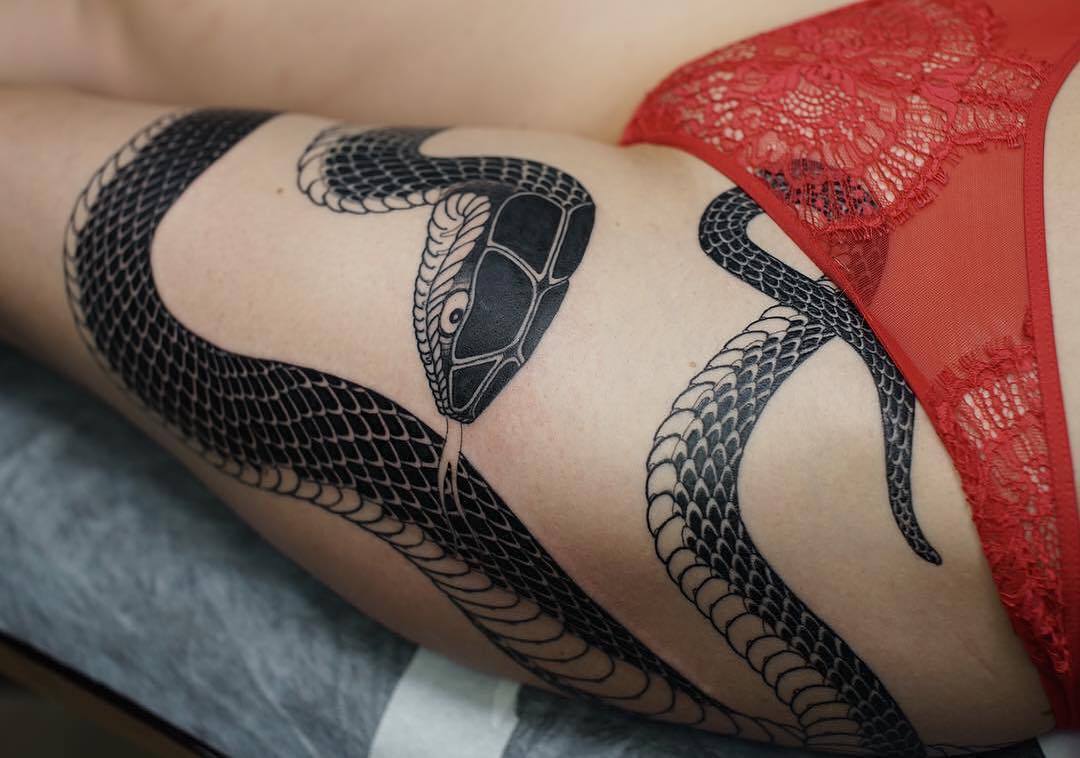 tattoosnob: Black snake by @ishpiricatattoo in St Petersburg, Russia. #snaketattoo