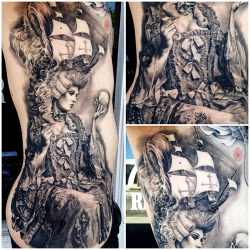 thievinggenius:  Tattoo done by Carlos Torres.