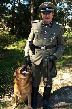 obersalzburg:  SS Officer and Smiling Dog:this is my brother who has been into 3rd Reich things since he was a kid.The smiling dog is my lovely Wolf boy