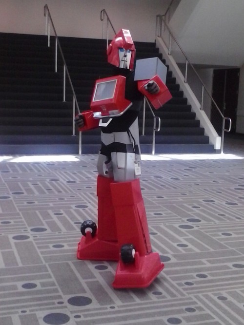 op-fangirl-21:  megacybertronianzero:  Top pic: An amazing Optimus cosplay with an equally detailed Iron Man cosplay! The guy displaying as Optimus used a device to give his voice a mechanized sound. WHOA.  Middle pic: IRONHIDE! Or shall I say, ARNHAAAD!