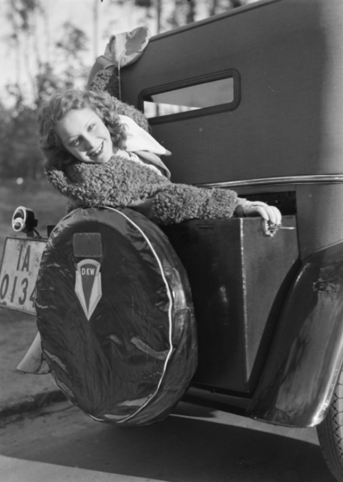 “Woman in the back of a DKW car, taken by Zoltan Glass, c. 1934. The photograph was taken duri