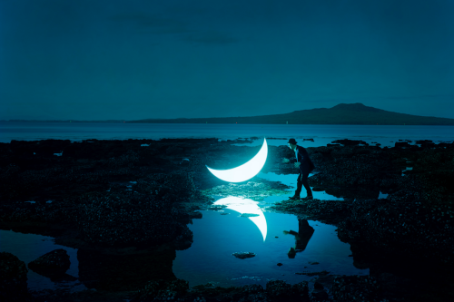 awkwardsituationist:for ten years now, leonid tishkov has traveled the world with his moon. here we see him in arctic sv