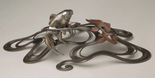 japaneseaesthetics:  Ornament of Fish in Waves (Okimono).  Japan, circa 1900.  Bronze, sil
