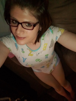 sophias-ageplay:  Found these while browsing older photos on my computer. This was my favorite onesie for the longest time. Not only was it my first one ever, but the design made me feel quite little. Shame it tore around the snaps. **Please don’t
