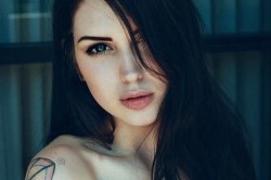 ASHLEY HOLAT