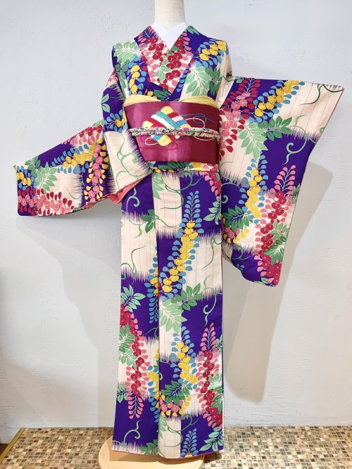 Joyful seasonal antique outfit, featuring a colorful fuji (wisteria) over ichimatsu (checks) kimono,