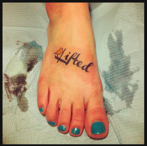 fuckyeahbrighteyes:  This person, NeonSignPhotography on Flickr, has several Bright Eyes tattoos! My favorite is the one that says lifted, on her foot.  If anyone has their own Bright Eyes/Conor Oberst themed tattoo they would like to submit, please