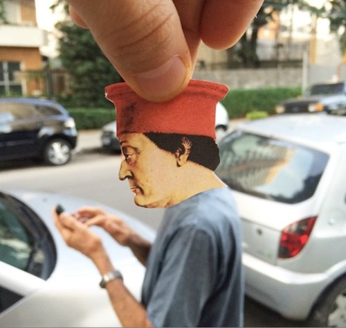 ART.LIESBrazilian-born Lorenzo Castellini walks the streets of São Paulo, inserting paper cutouts of