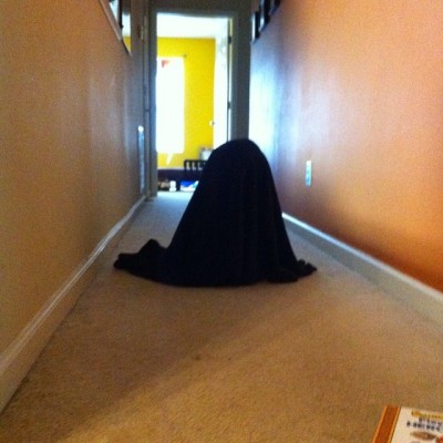 So… I turned to walk down the hallway and saw this sitting there. It’s my child… Under a blanket… Sitting motionless. Can we say creeped out? Lol. I’m like ‘Get your crazy behind from underneath that blanket before you give your mother a heart...