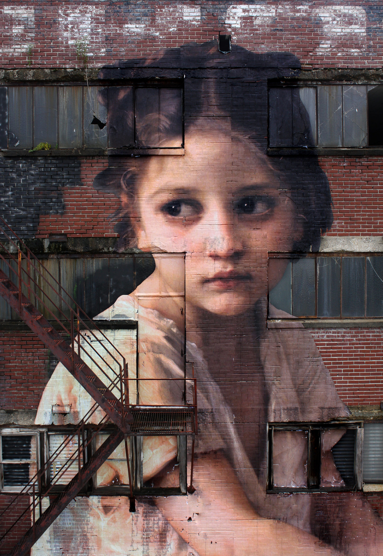 itscolossal: A Neoclassical Girl Towers Over Memphis in a Seven-Story Wheatpaste