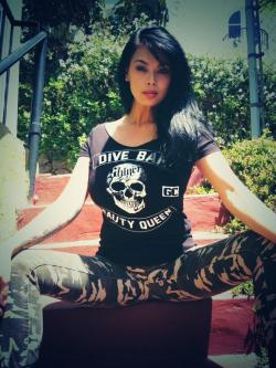 Tera Patrick in a t-shirt and camo pants…