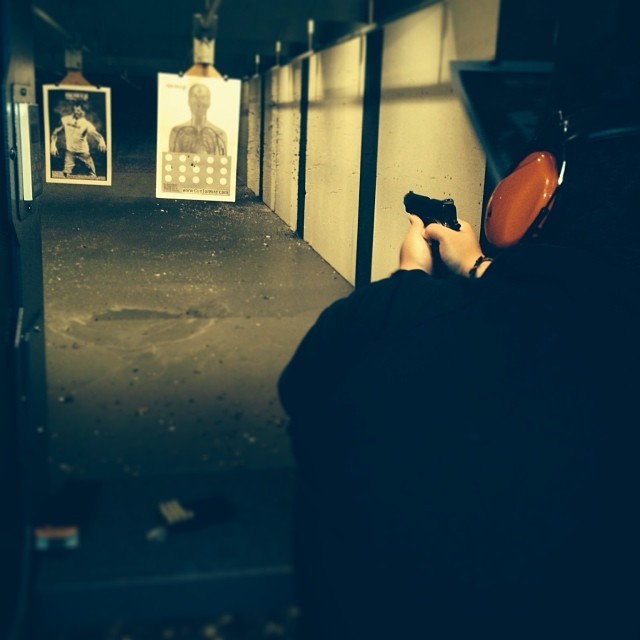 Target shooting with a 45  (at Gun For Hire @ The Woodland Park Range)