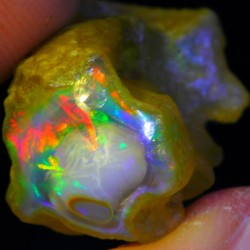 mineralists:  Bright neon flashes in this fantastic Welo Opal!
