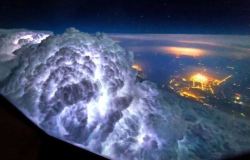 sixpenceee:   Thunderclouds look amazing from an aerial view. (Source)