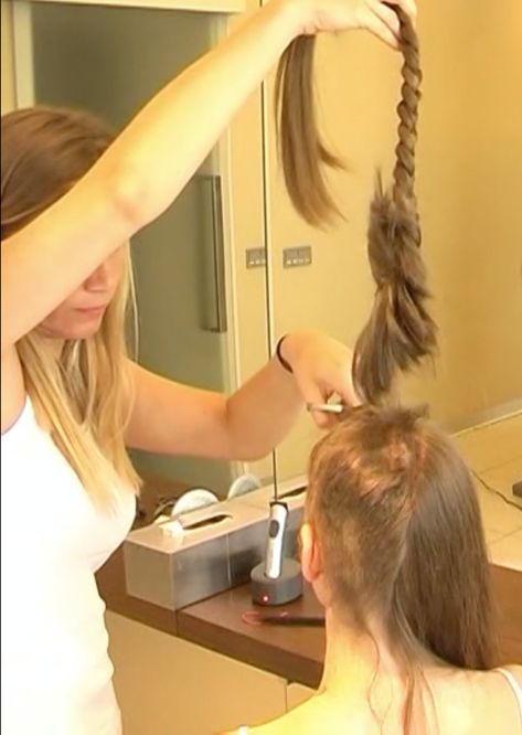 Taking a nice trophy before bringing out the clippers to finish the haircut….