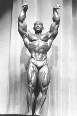 oldiegoldies:  Truly amazing signature pose by Sergio Oliva! ~OldiesGoldies