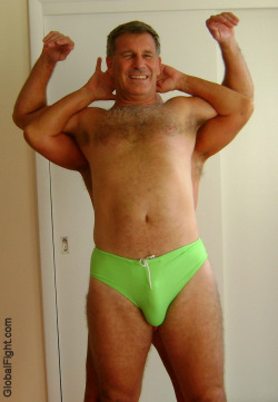 wrestlerswrestlingphotos:  dads big hairy chest belly button bulging speedos