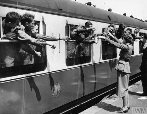 paulinedorchester: A woman from the Mechanised Transport Corps (MTC) hands out tea to troops evacuat