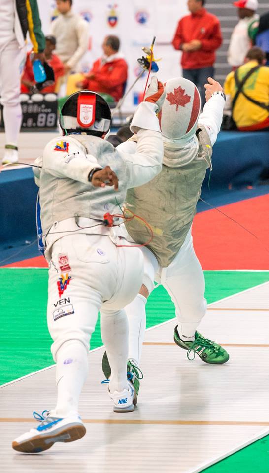 couragefencing:  modernfencing:  [ID: a fencer losing his foil as he and his opponent