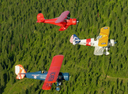 the-b-train:  planeshots:  Formation flight Sunday.  Beech staggerwing top left