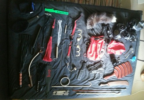 submissivefeminist:  propertyofboss:Finally got photos of our toy collection, 90% of it at least, there is probably stuff I missed and doesn’t include lingerie or anything.   A what’s what list… Pic 1. (From left to right)  Two sided fuzzy and flat