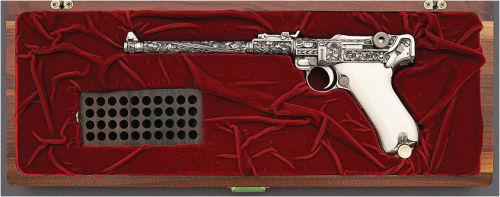 A cased 1917 dated Luger Artillery Pistol engraved by Ben Shostle.