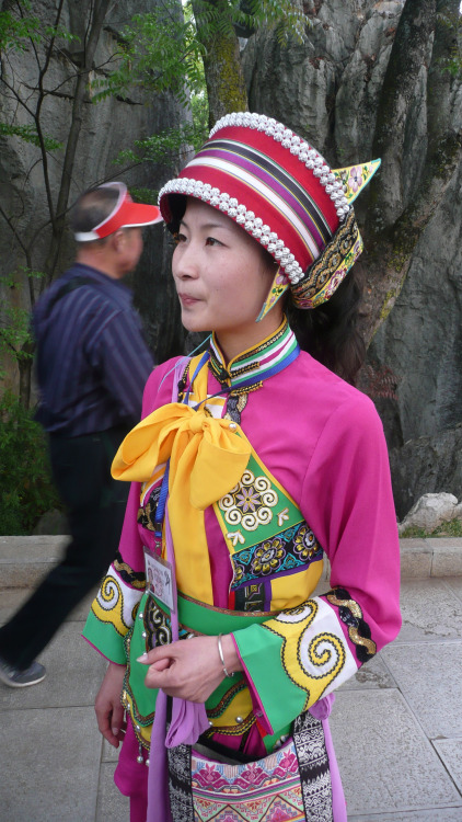 Chinese girl of the Sani Yi minority in traditional dress