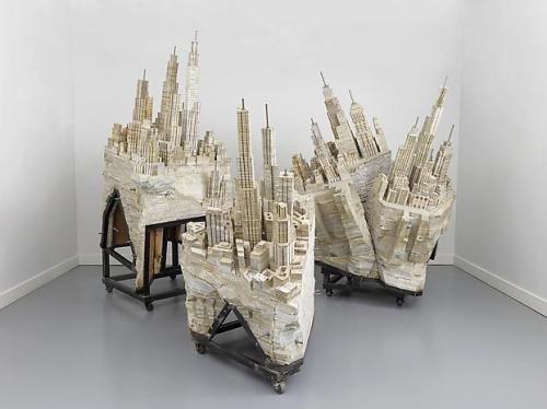 wordsnquotes:  culturenlifestyle:Abandoned Cityscape Book Sculpture by Liu WeiBeijing-based artist Liu Wei carved a stunningly rugged abandoned cityscape from a massive stack of paperback books. He reshaped his materials into one body. New York City-based