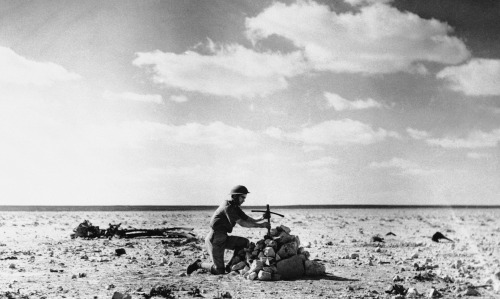 georgy-konstantinovich-zhukov:“An RAF Airman places a cross, made from the wreckage of an Airc