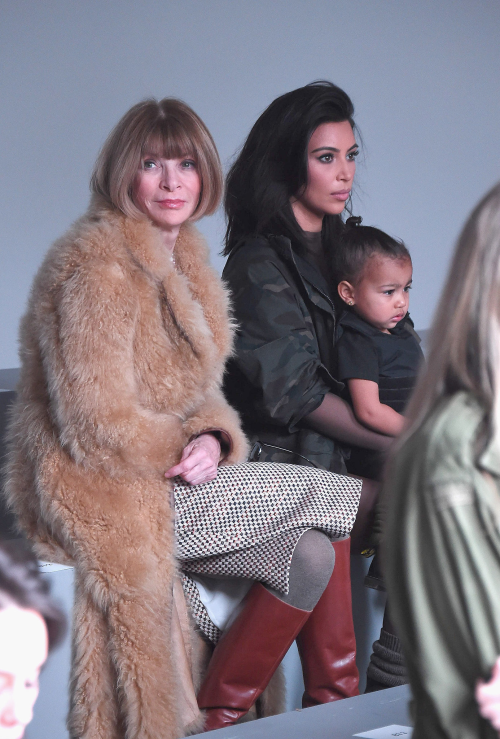 prayforprada:  kimkardashianfashionstyle:February 12, 2015 - Kim Kardashian, Anna Wintour & North West at the Kanye West/Adidas Fall 2015 Fashion Show in NYC.  i need a credit line for annas outfit because that coat is cute