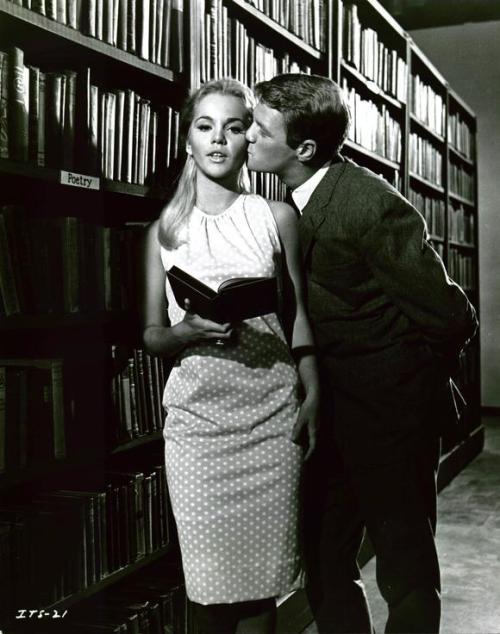 A kiss in the library in the poetry stacks. From Skakespeare, O Mistress Mine.What is love? &lsquo;T