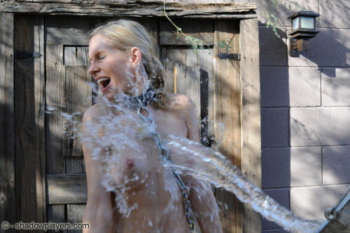 bondage-ponygirls-and-more: Giving your slave a cold water bath outdoors. More athttp://www.shadowplayers.com DVDs for sale by mail (best price) at:http://www.shadowplayers.com/Sales.html  Or online through http://videos4sale.com/1028 Download video clips