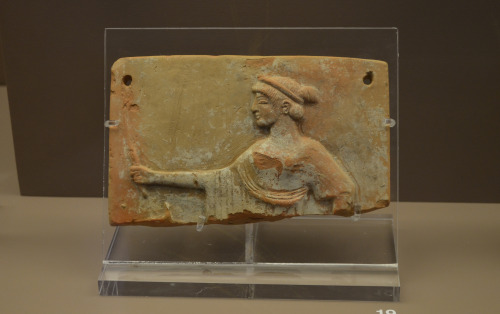 greek-museums:Archaeological Museum of Brauron:Terracotta votive tablets with depictions of the godd