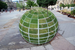 sixpenceee:This park in Paris looks like it has a giant 3D globe, but its actually flat. 