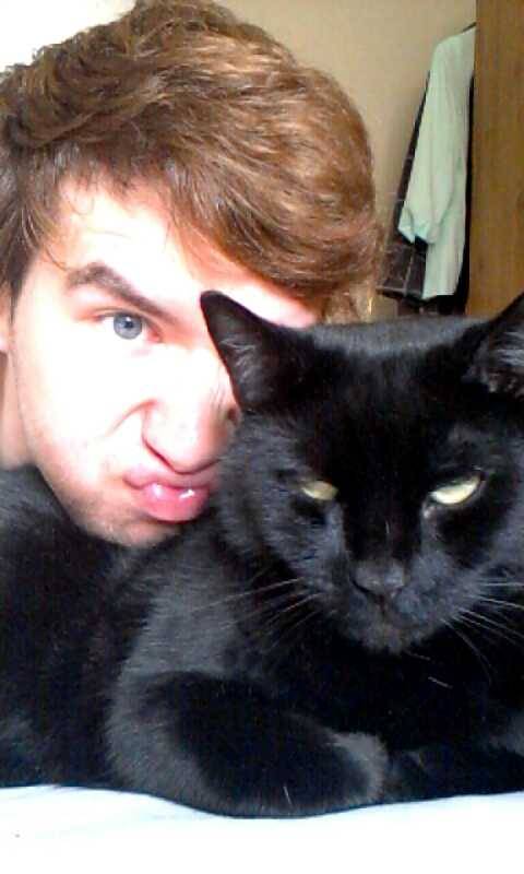 sombre-songbird:Me and my cat ,Oscar, who hates me (but loves me at night when theres