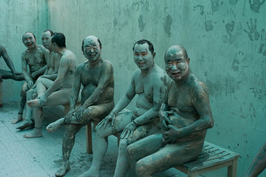 unrar:  South Korea, Boryeong. Daecheon Beach. 11th annual Mud Festival. Men cover