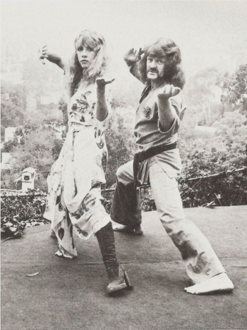 Stevie practicing some karate moves in her backyard with her bodyguard Bob Jones - 1977.