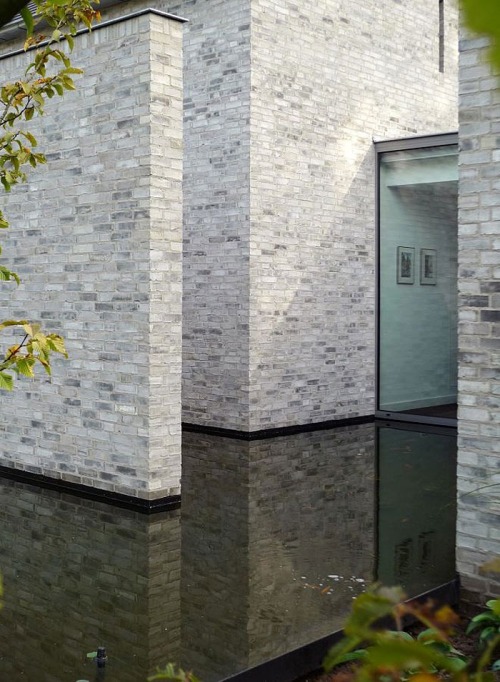 shedhaus:  floating stone.. Inspiring design, ‘secluded’ windows and revealing apertures. house envy