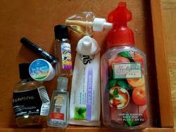 All right, here’s the empties for July!  It’s a little weak- not everything is photographed and even then, I didn’t use up too many individual products.  I’m trying to use up full sizes right now so I can make moving to our new apartment (!!!!)