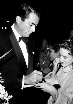mattybing1025:  Gregory Peck signs an autograph for a fan, c. 1950s. 