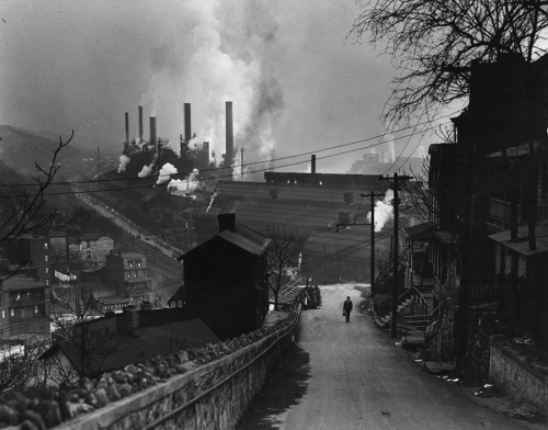 Hillside houses overlook smoke-belching steel mills in Pittsburgh, Pennsylvania, 1949. Photograph by