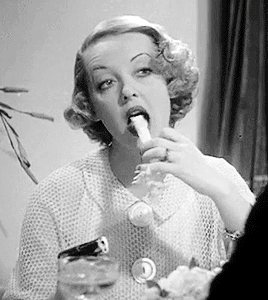 secondhandroses:Bette Davis sarcastically eating celery Satan Met a Lady (1936 ) & All About Eve