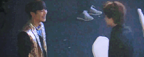 mintytaemin:    Taemin surprising Kai from behind and Kai playfully punching Taemin as a revenge   