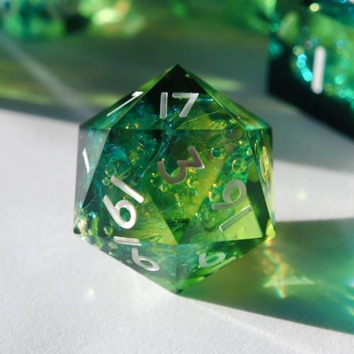 littlealienproducts: Poisoner’s Delight - green holographic dice by EverythingDiceCo