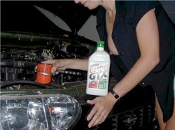 skychaser66:  My wife helping me with the oil change in her mini-van.  Comment and she will let me post more!