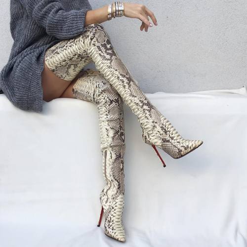 fashion-boots:upcloseandstylish in Christian Louboutin Snakeskin Thigh High Boots.Source: upcloseand