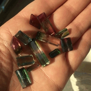 Handful Of Love!Bi-colored Tourmaline Faceted Stones.See My Favorite Herehttp://www.crystalarium.com/index.php/tourmaline-tri-colored-tourmaline-faceted-7-48ct-gemstone.html