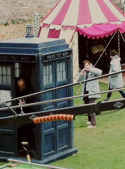 nickmilller:  David taking a picture of his TARDIS on set in Chepstow Castle (x)