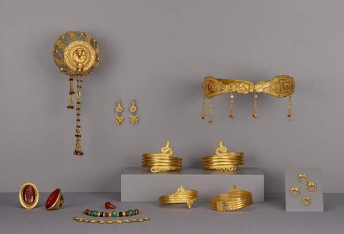  Collection of Ptolemaic Jewelry:This group of gold jewelry is comprised of a hair net with a repous